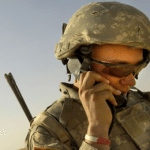 special forces talking on sattelite phone